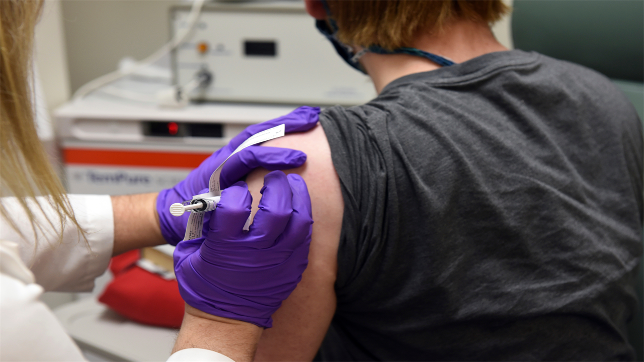 Covid vaccine will have an impact by summer and normal life will resume by next winter, says scientist behind Pfizer jab