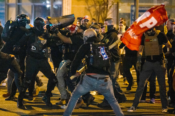 Thousands rally in Washington as clashes erupt.