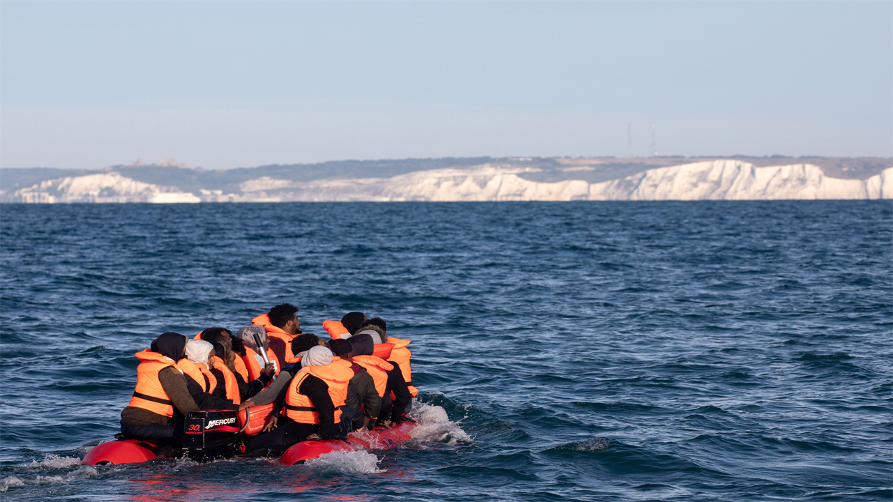 Asylum-seekers arriving in record numbers cost taxpayers at least £350m a year to support