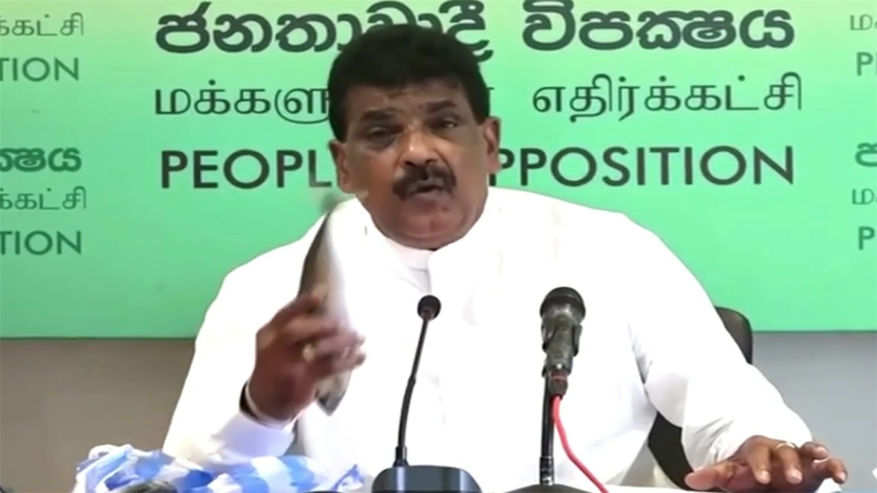 Bizarre moment Sri Lankan politician bites into raw fish to prove it won’t give you Covid after conspiracy frenzy