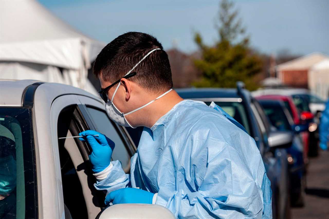 US hits ANOTHER record high day with 185k Covid cases as overwhelmed hospitals convert parking garages to treat patients