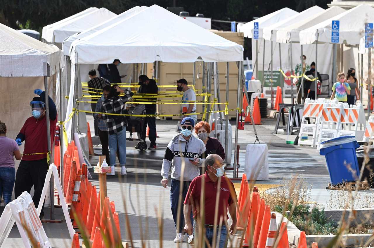 US daily coronavirus cases smash 200k for FIRST time as infections and death toll continues to rise