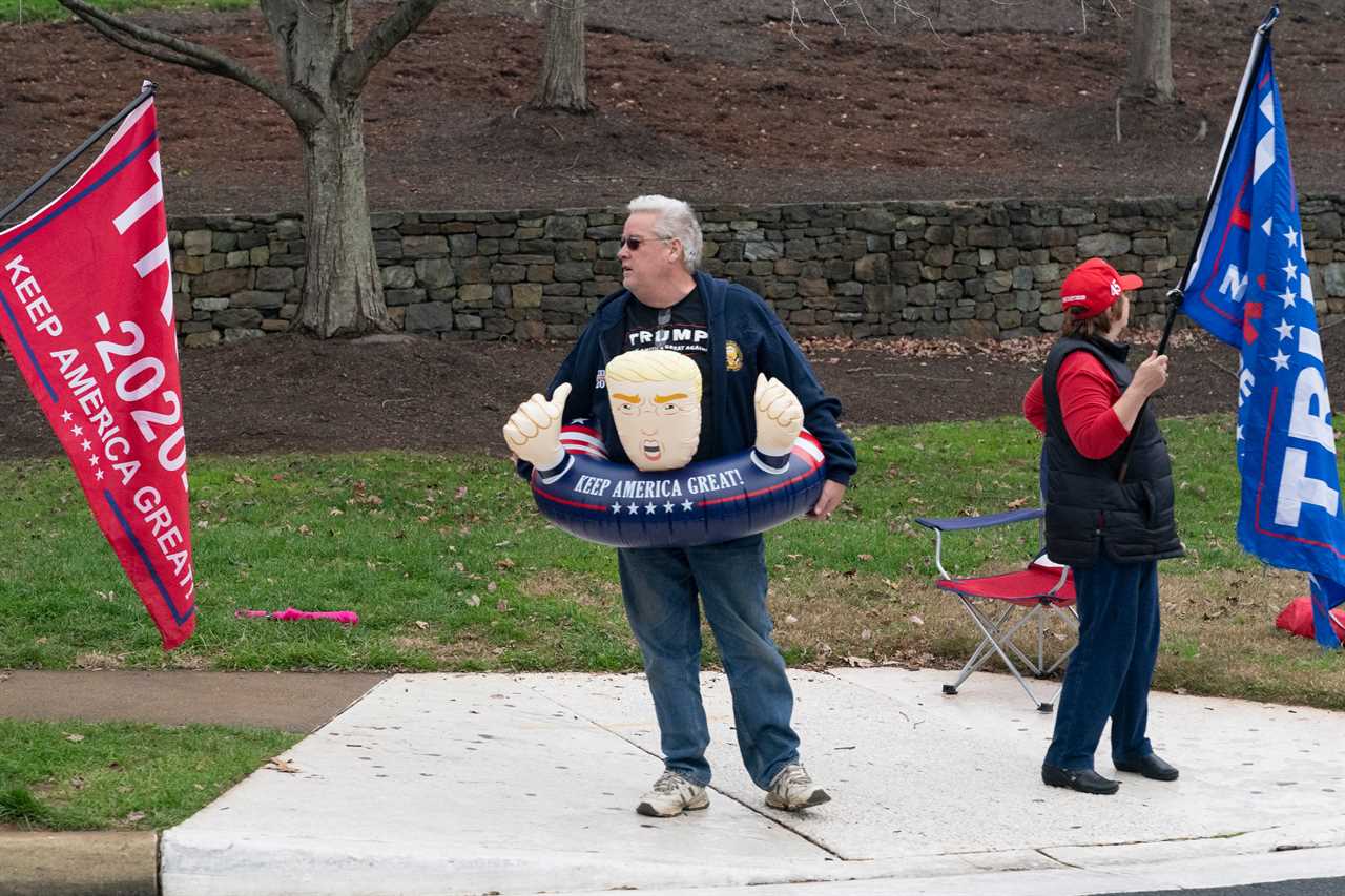 Trump supporter charged with ASSAULT ‘for forcefully exhaling on protesters’ outside president’s Virginia golf club