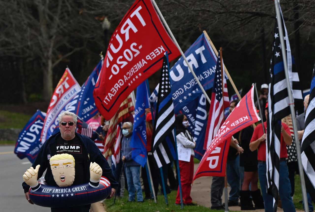 Trump supporter charged with ASSAULT ‘for forcefully exhaling on protesters’ outside president’s Virginia golf club