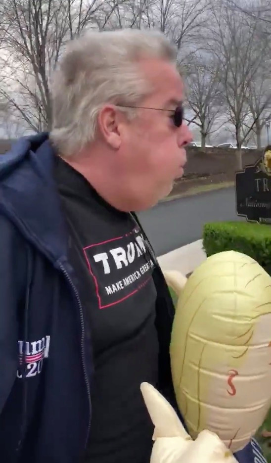 Trump supporter charged with ASSAULT ‘for forcefully exhaling on protesters’ outside president’s Virginia golf club