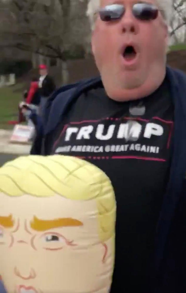 Trump supporter charged with ASSAULT ‘for forcefully exhaling on protesters’ outside president’s Virginia golf club