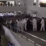 Dramatic moment THOUSANDS are herded into basement by hazmat staff at Shanghai airport after worker catches Covid