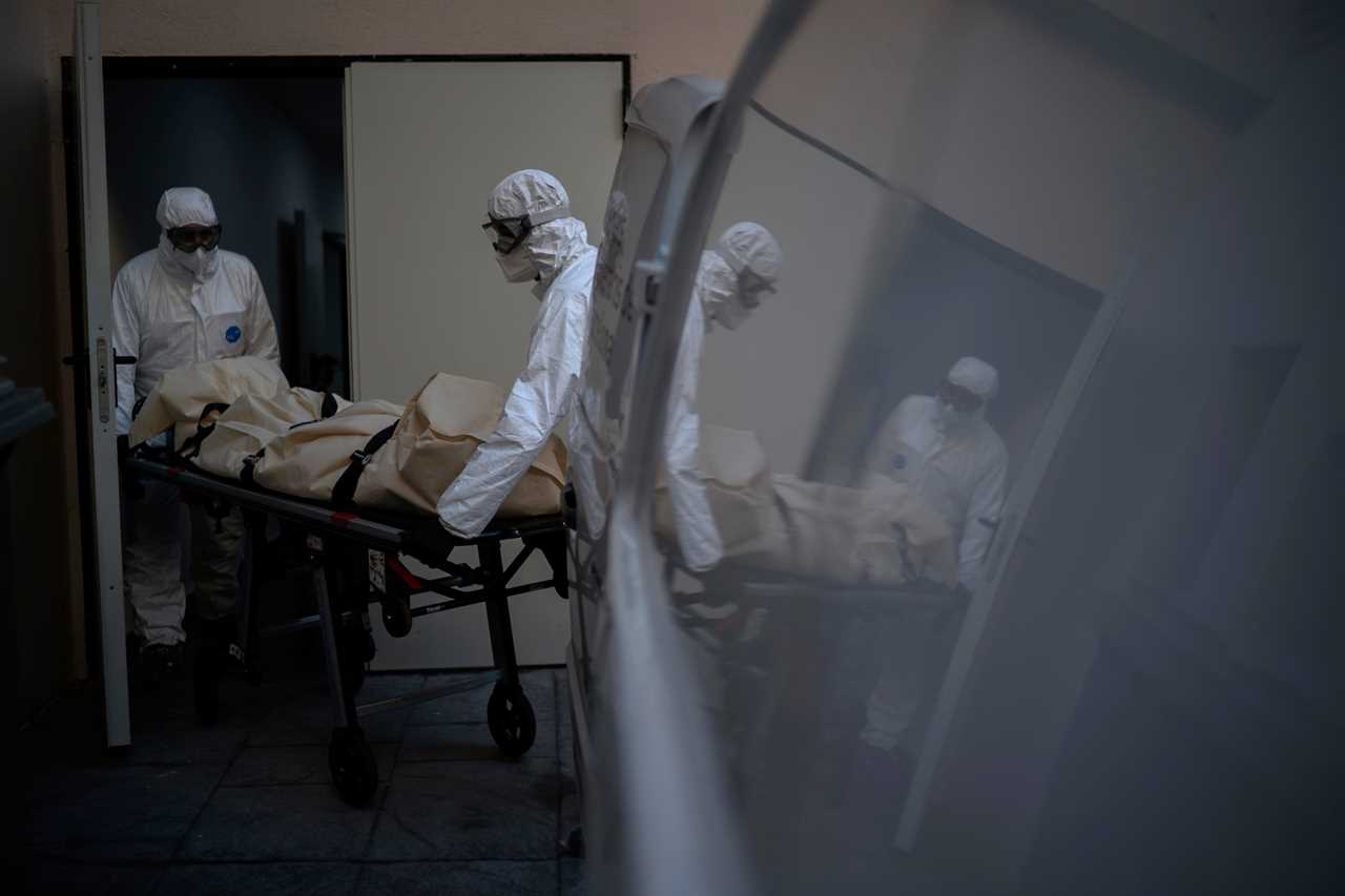 Covid victims wrapped in bedsheets left just inches from residents as Spain’s care homes feel brunt of second wave