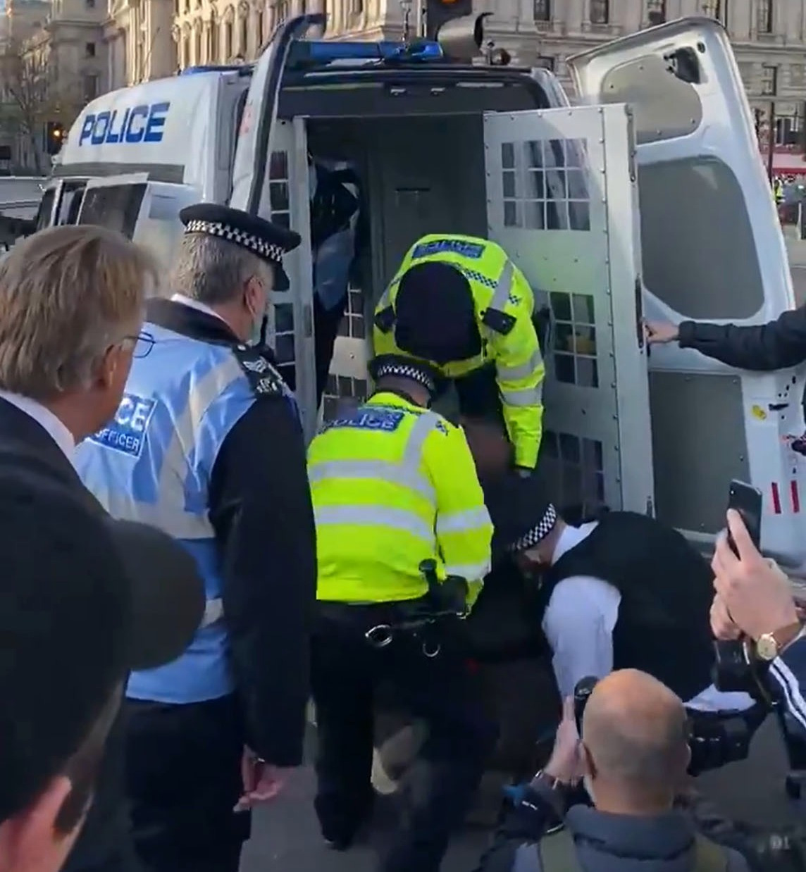 Tory MP rages at ‘disgraceful and un-British’ police after woman, 72, bundled into a van at protest outside Parliament