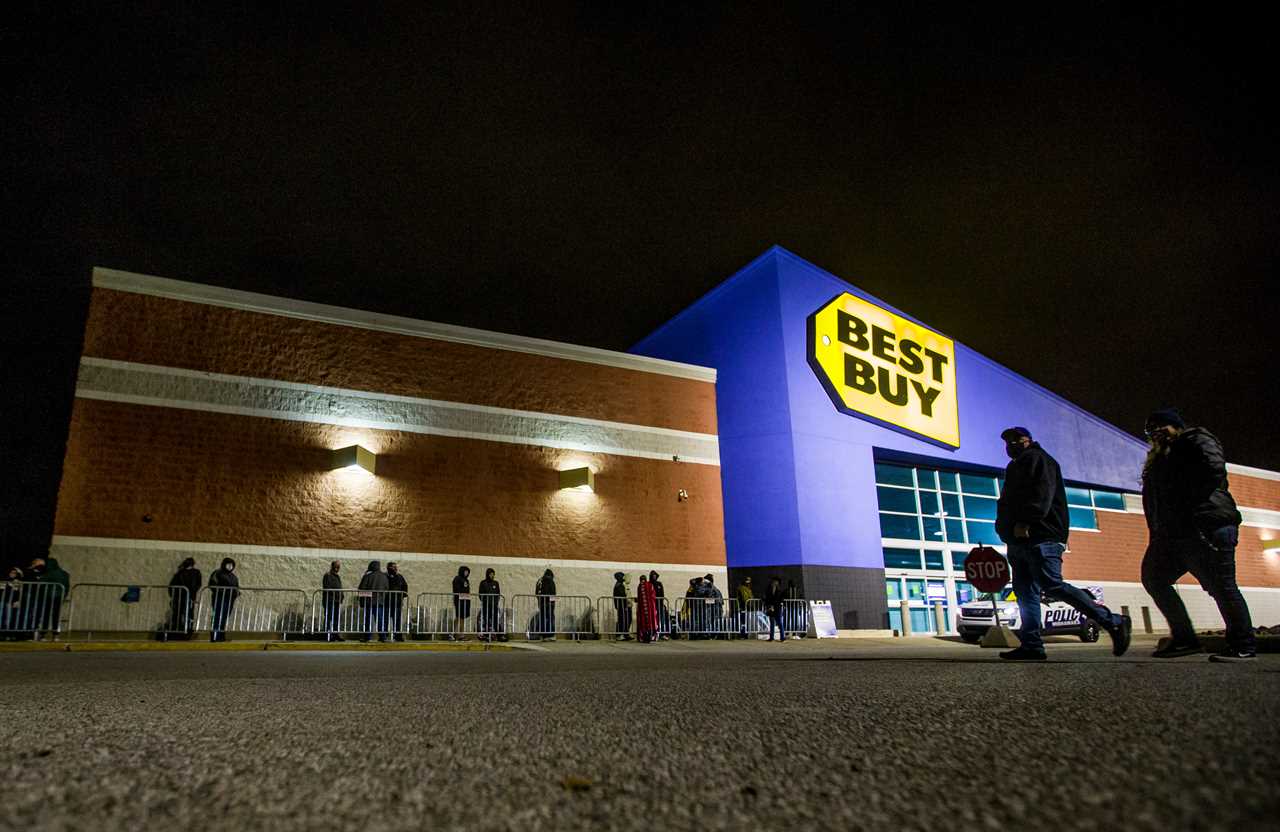 Shoppers line up for Black Friday deals despite Covid with retailers beefing up security to enforce social distancing