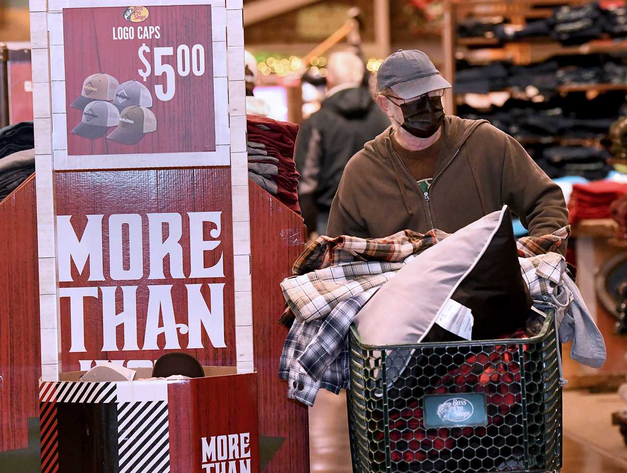 Shoppers line up for Black Friday deals despite Covid with retailers beefing up security to enforce social distancing