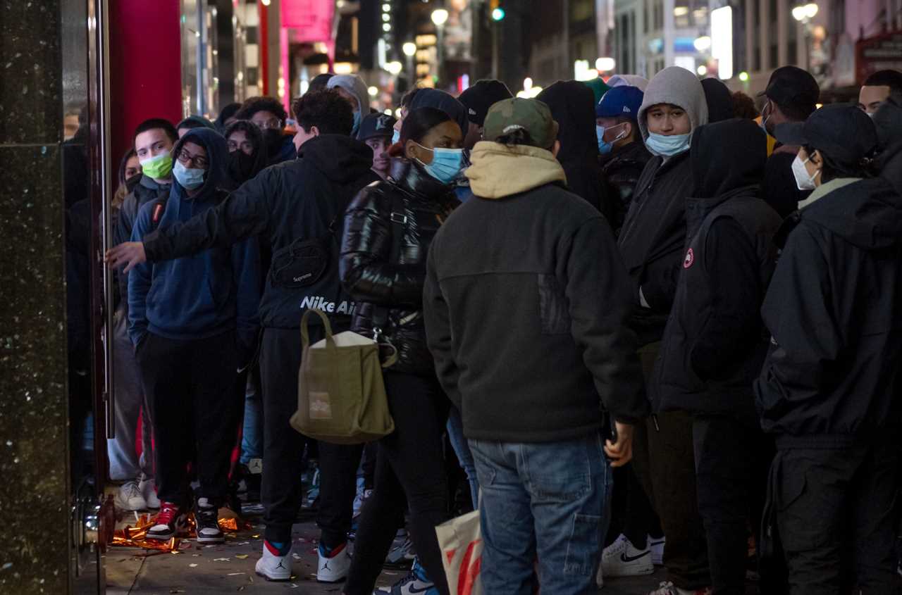 Shoppers line up for Black Friday deals despite Covid with retailers beefing up security to enforce social distancing