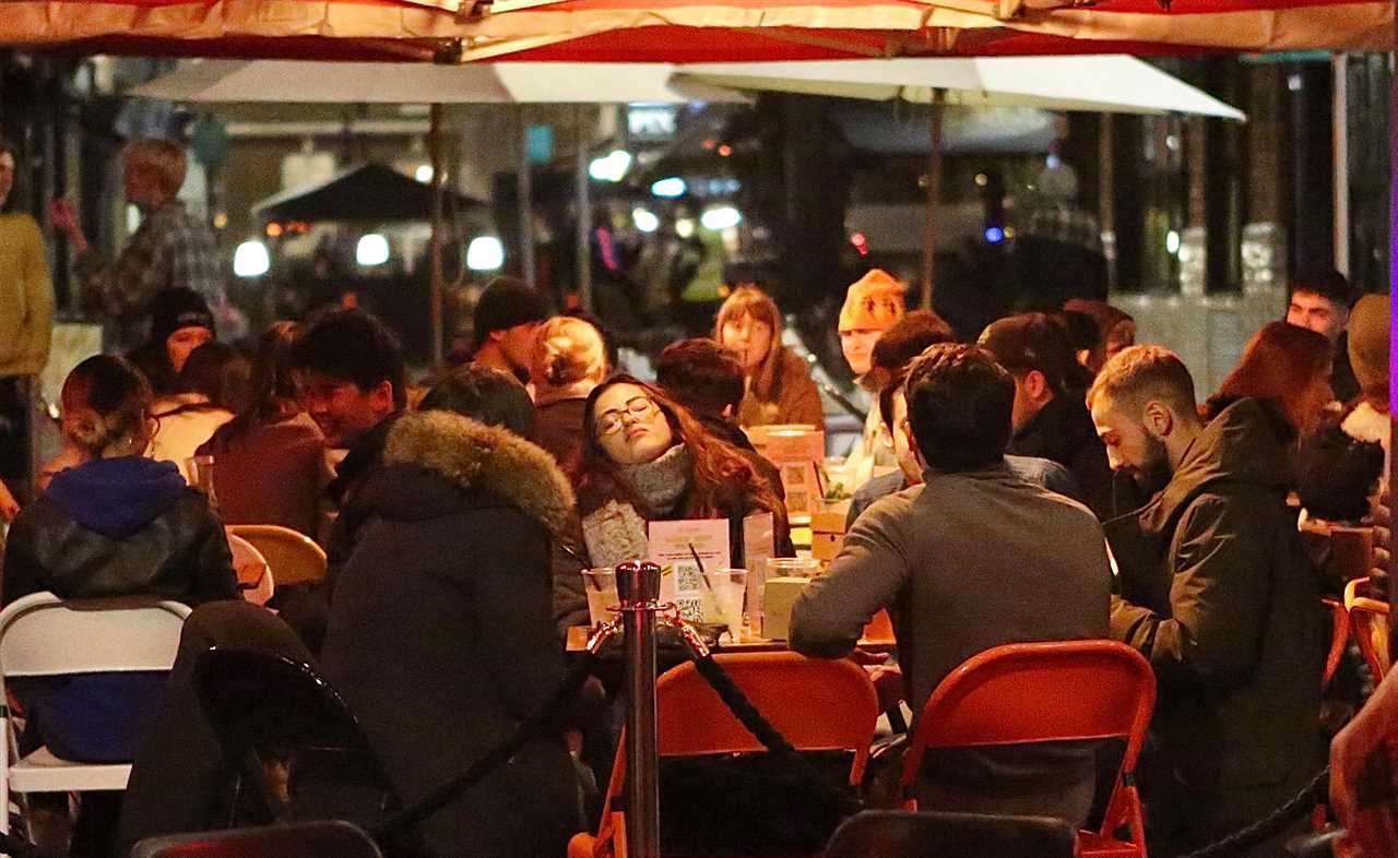 Brits hit the bars after month-long lockdown – as Tier 2 punters wrap up for drinks al fresco