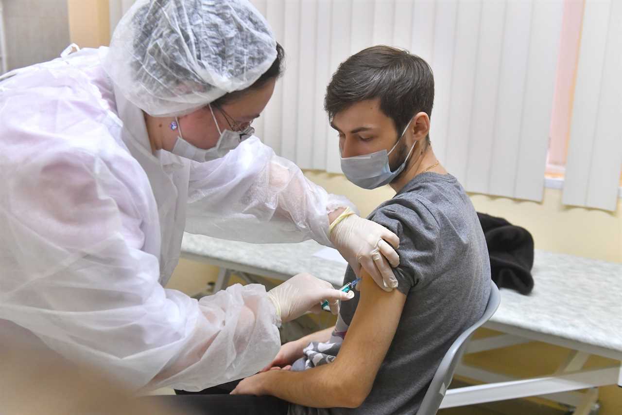 Russia begins Covid vaccinations in Moscow with untested jab after state workers ‘forced to take part in trials’