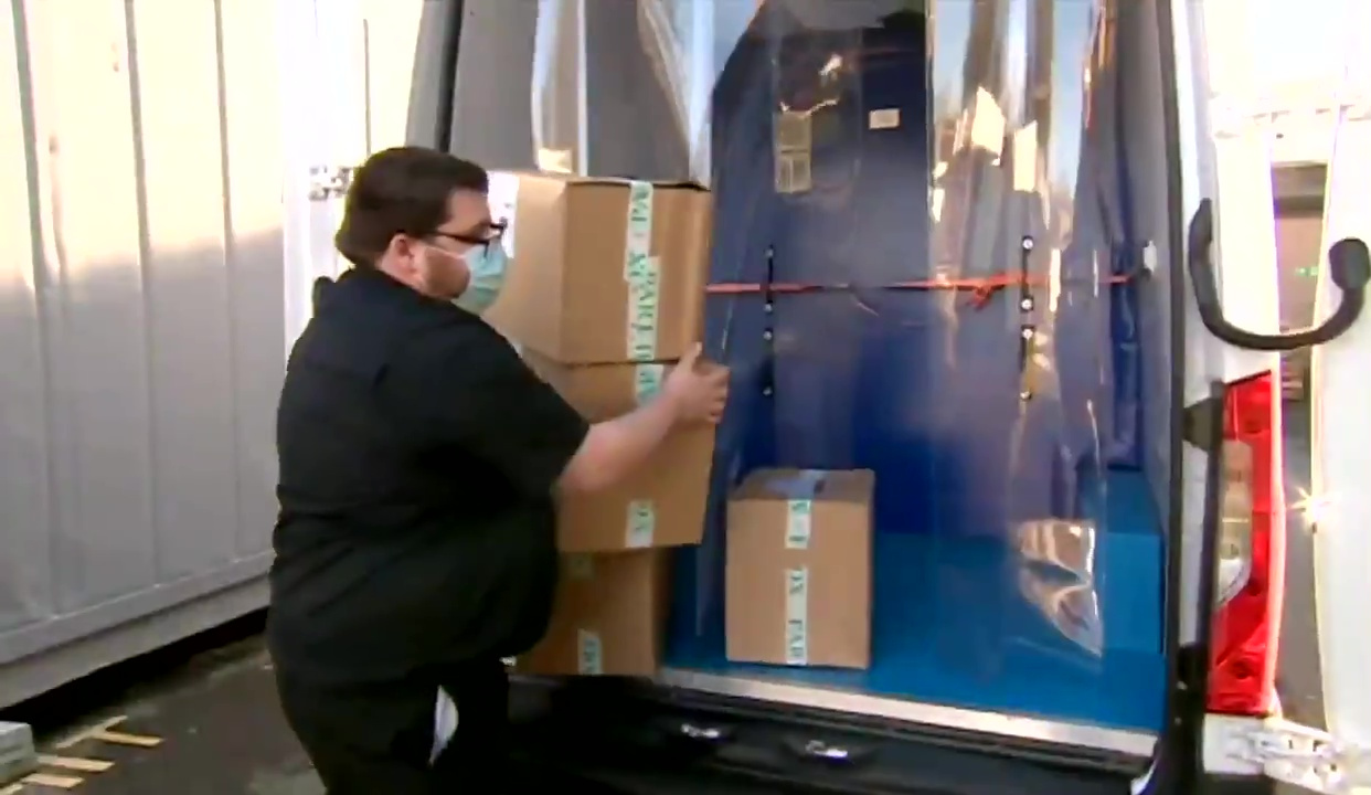 A batch of the vaccine being unloaded at Croydon University Hospital