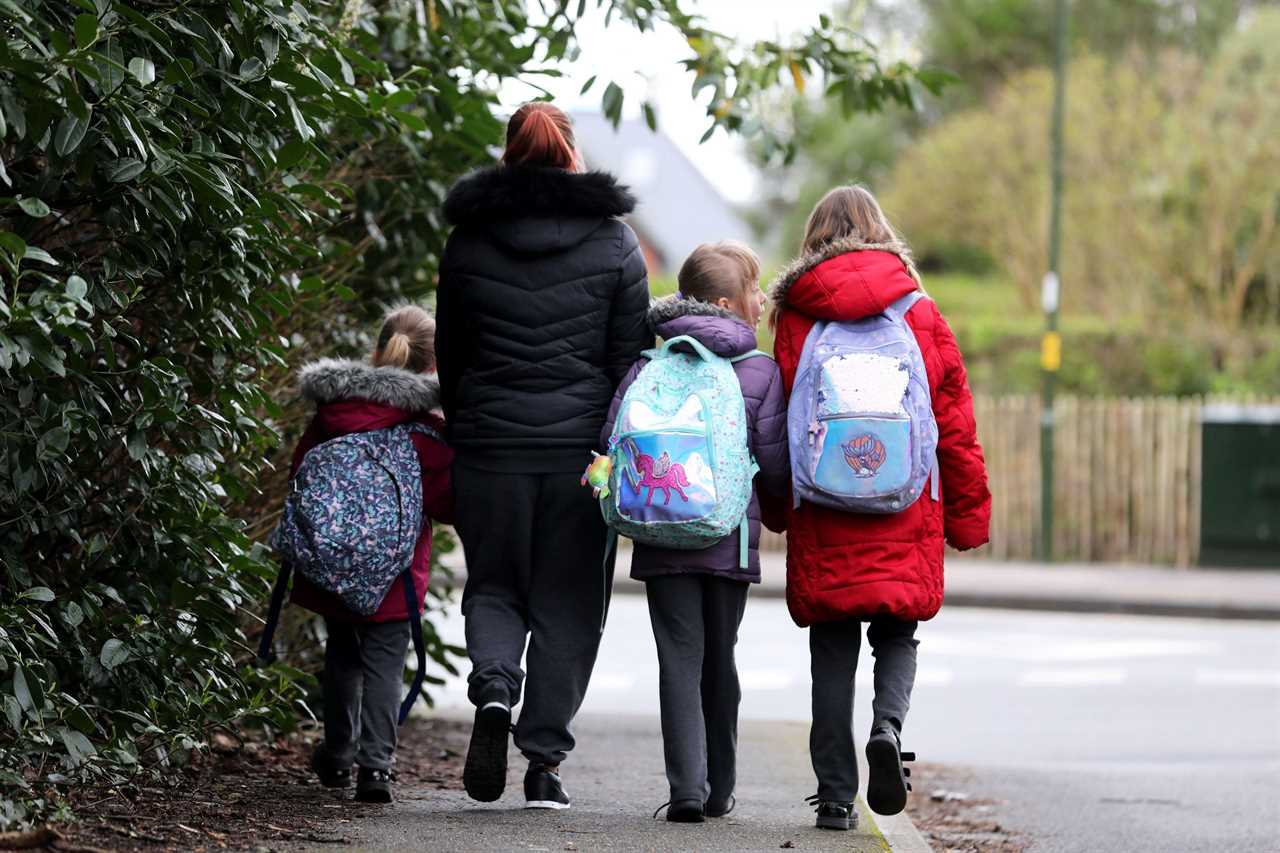 Children on their way to school this morning on what will be their last day