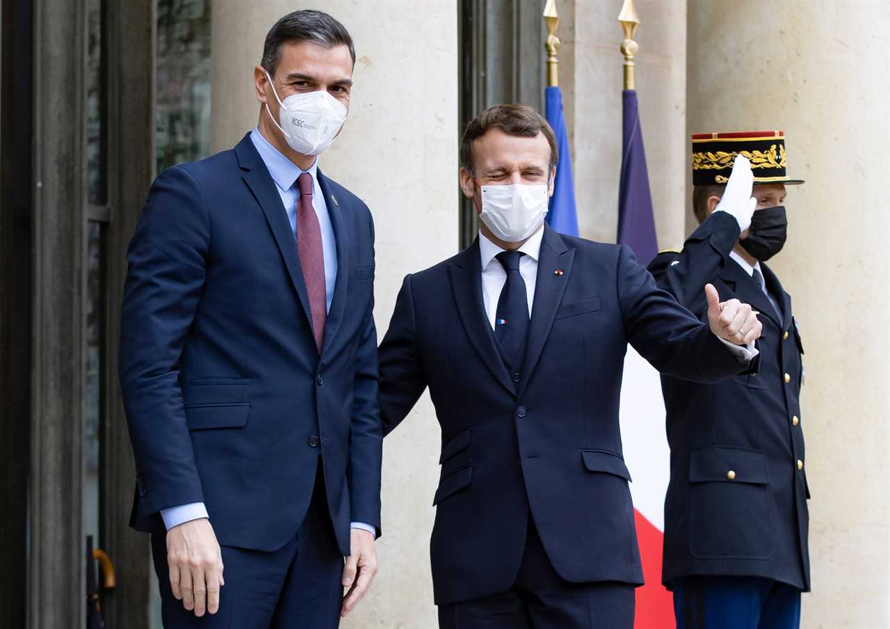 Covid-hit Macron struck down with ‘fever’ and has doc at his bedside as he apologises for cosying up to EU leaders