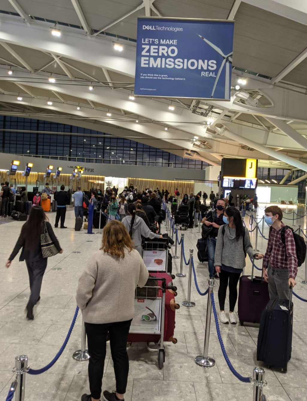 Covid fears at Heathrow after pictures show passengers packed together in snaking queues as Christmas getaway begins