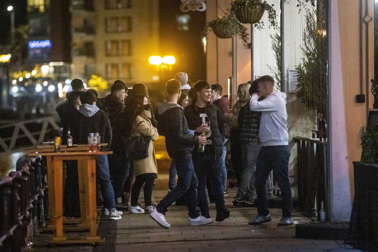 Bristol party-goers pack pubs and bars to celebrate moving into Tier 2 – as millions across UK face tougher restrictions