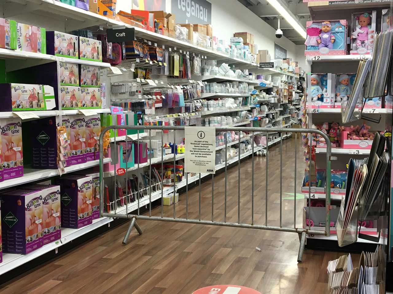 Closed off sections in an Asda store in Cardiff on the first day of the Christmas lockdown in Wales.