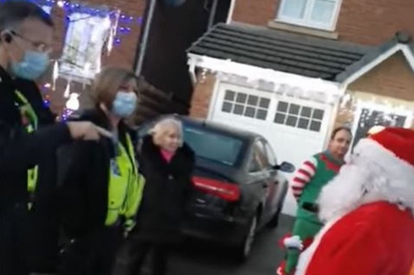 Man dressed as Father Christmas gets telling off from cops over social distancing  at ‘winter wonderland’ house