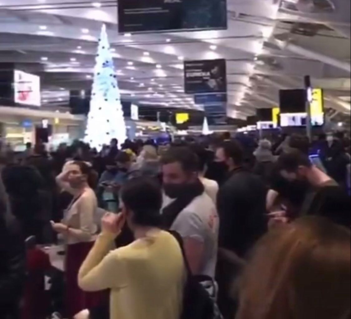 Mammoth queues at Heathrow as families try to get away before Christmas despite 40 countries closing borders to Brits