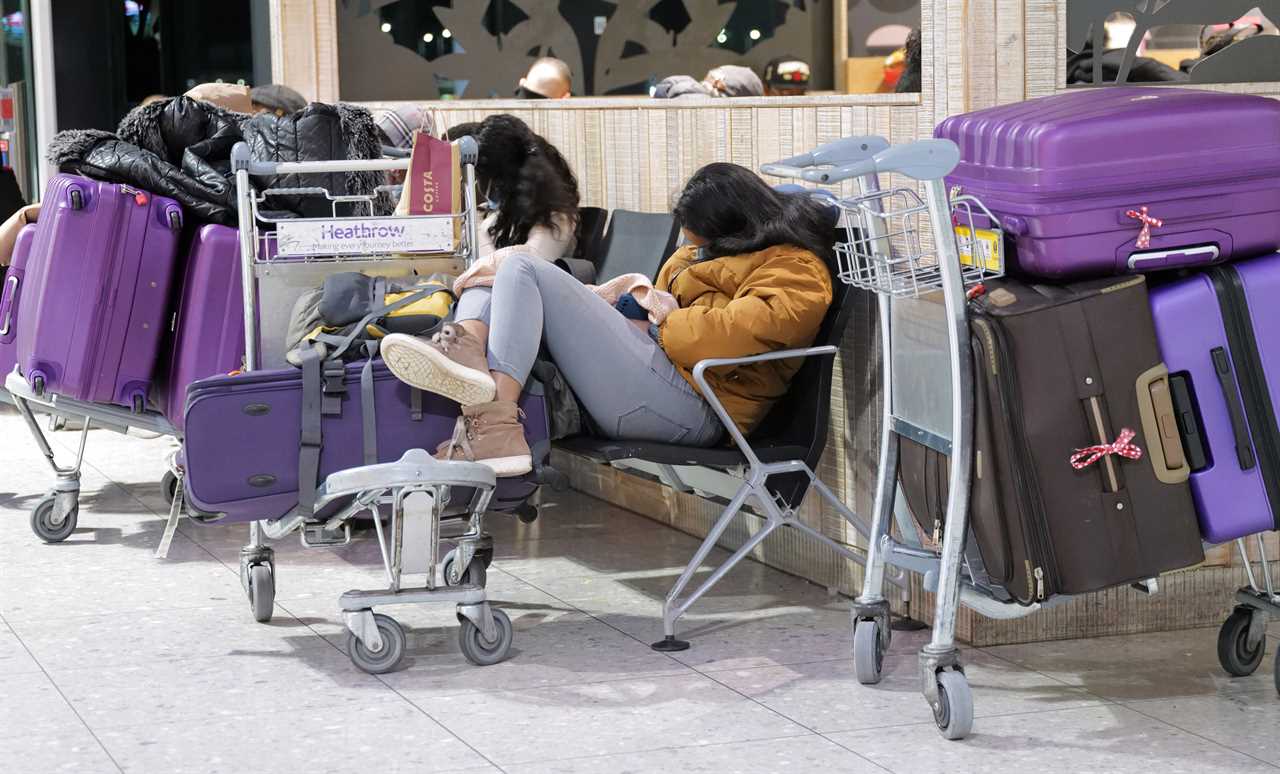 Mammoth queues at Heathrow as families try to get away before Christmas despite 40 countries closing borders to Brits