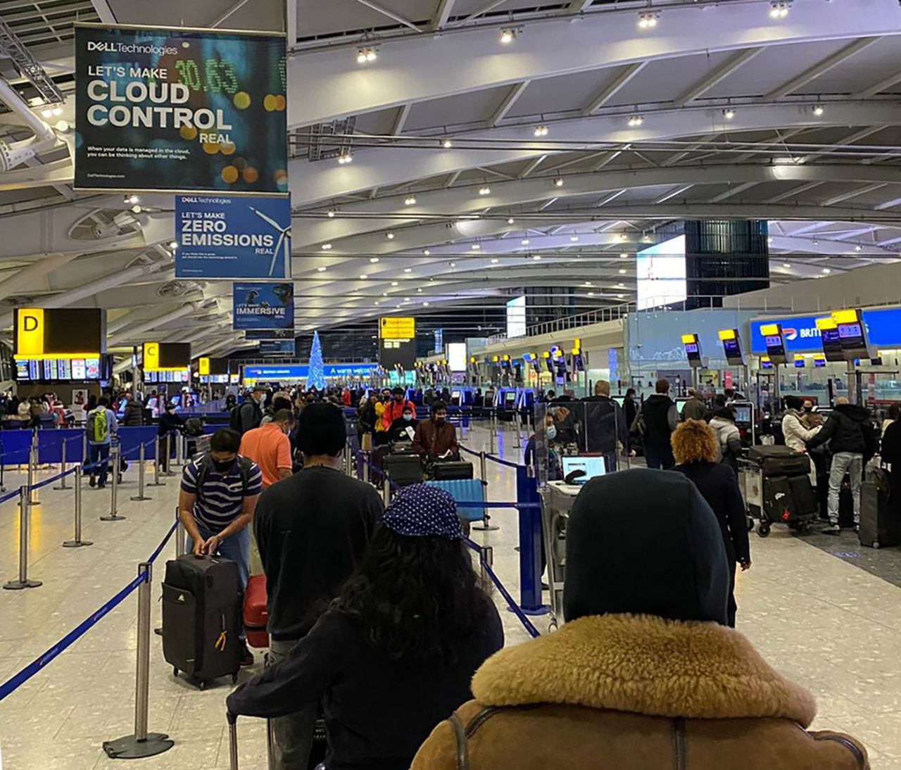 Mammoth queues at Heathrow as families try to get away before Christmas despite 40 countries closing borders to Brits