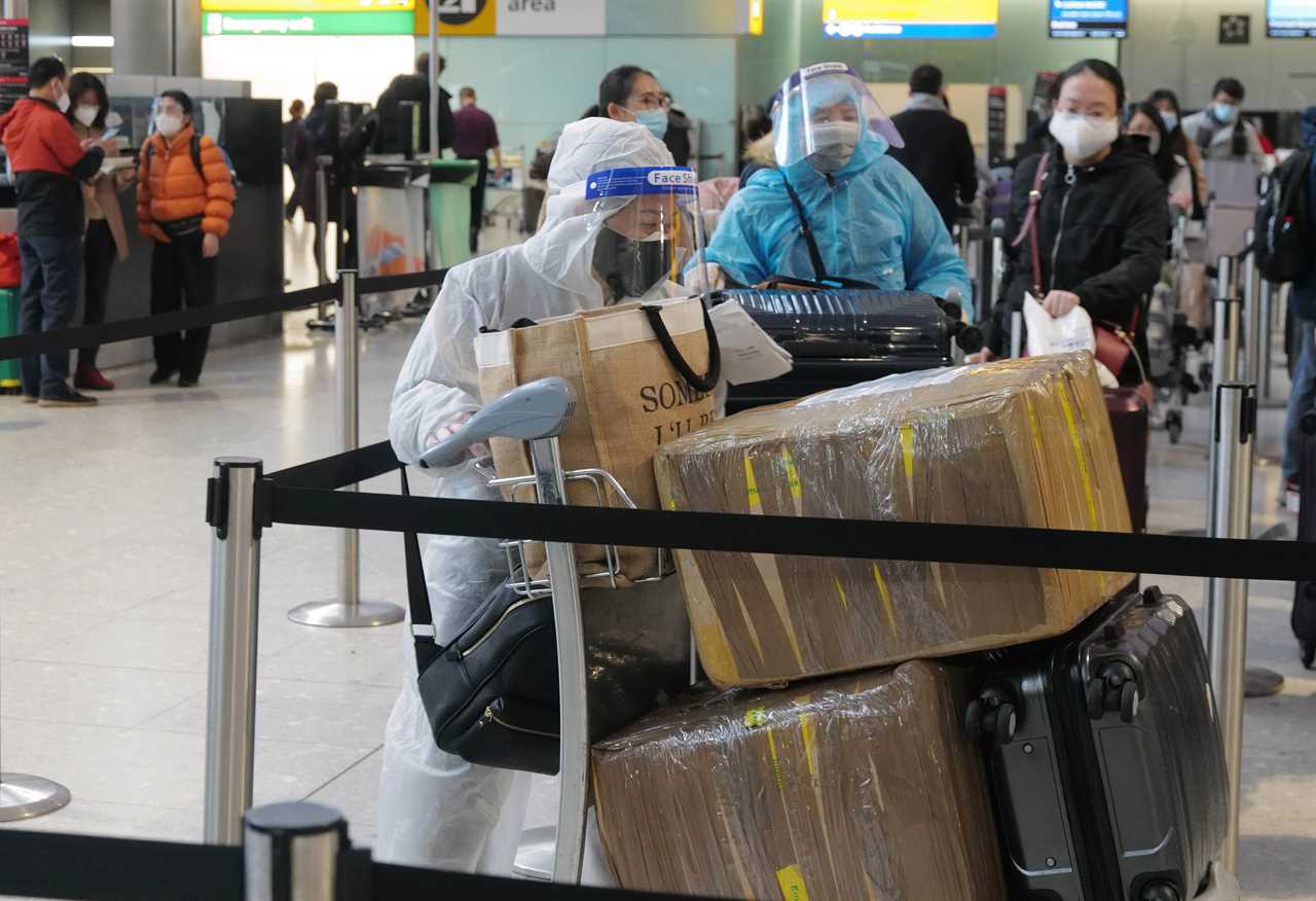 Mammoth queues at Heathrow as families try to get away before Christmas despite 40 countries closing borders to Brits