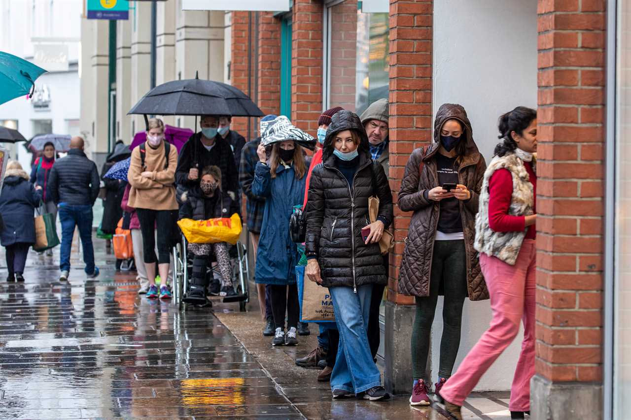 Panic-buyers queue around the block in rain to stockpile last-minute Christmas food amid ‘rationing’