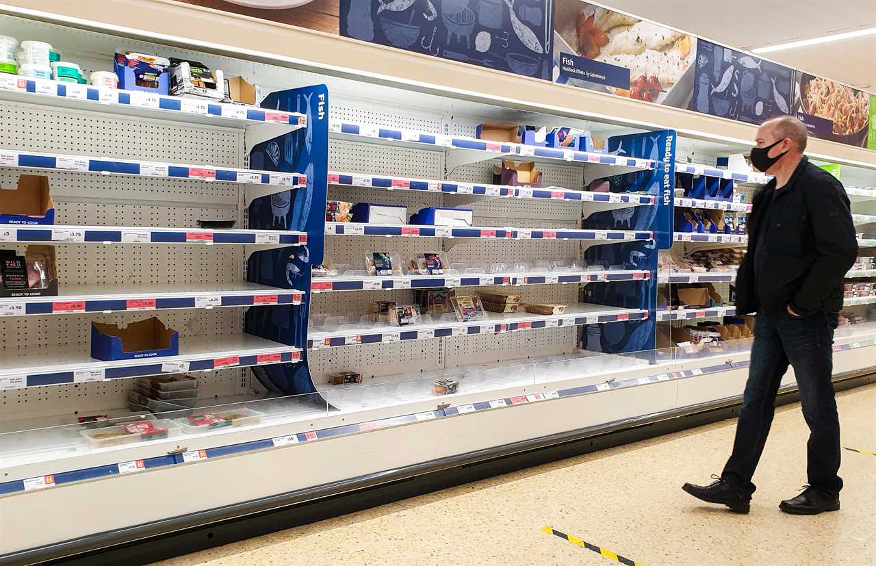 Panic-buyers queue around the block in rain to stockpile last-minute Christmas food amid ‘rationing’