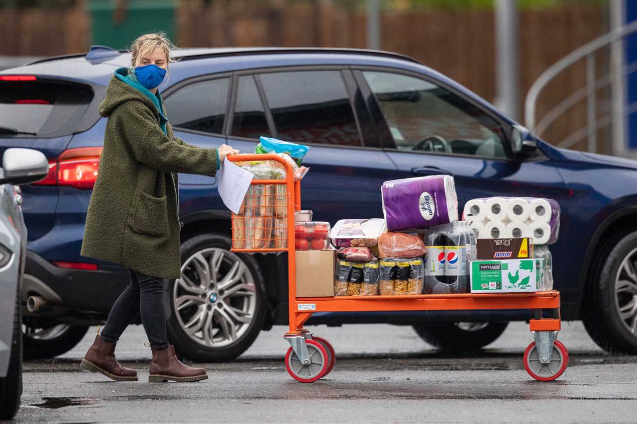 Panic-buyers queue around the block in rain to stockpile last-minute Christmas food amid ‘rationing’