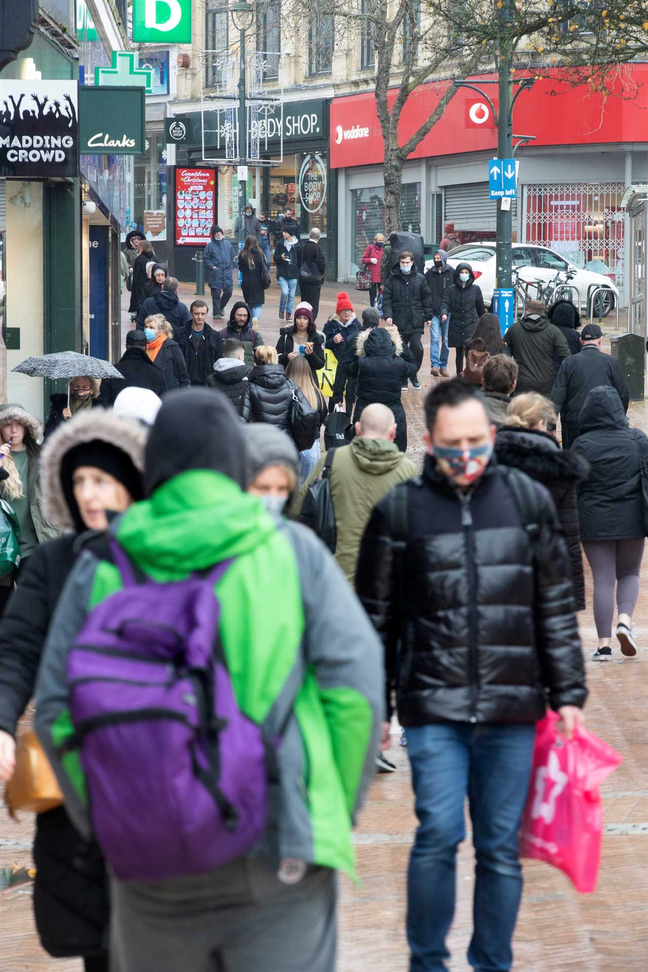 Panic-buyers queue around the block in rain to stockpile last-minute Christmas food amid ‘rationing’