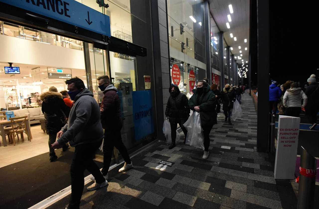 Bargain hunters queue from 4am to get their hands on the best deals in the Boxing Day sales