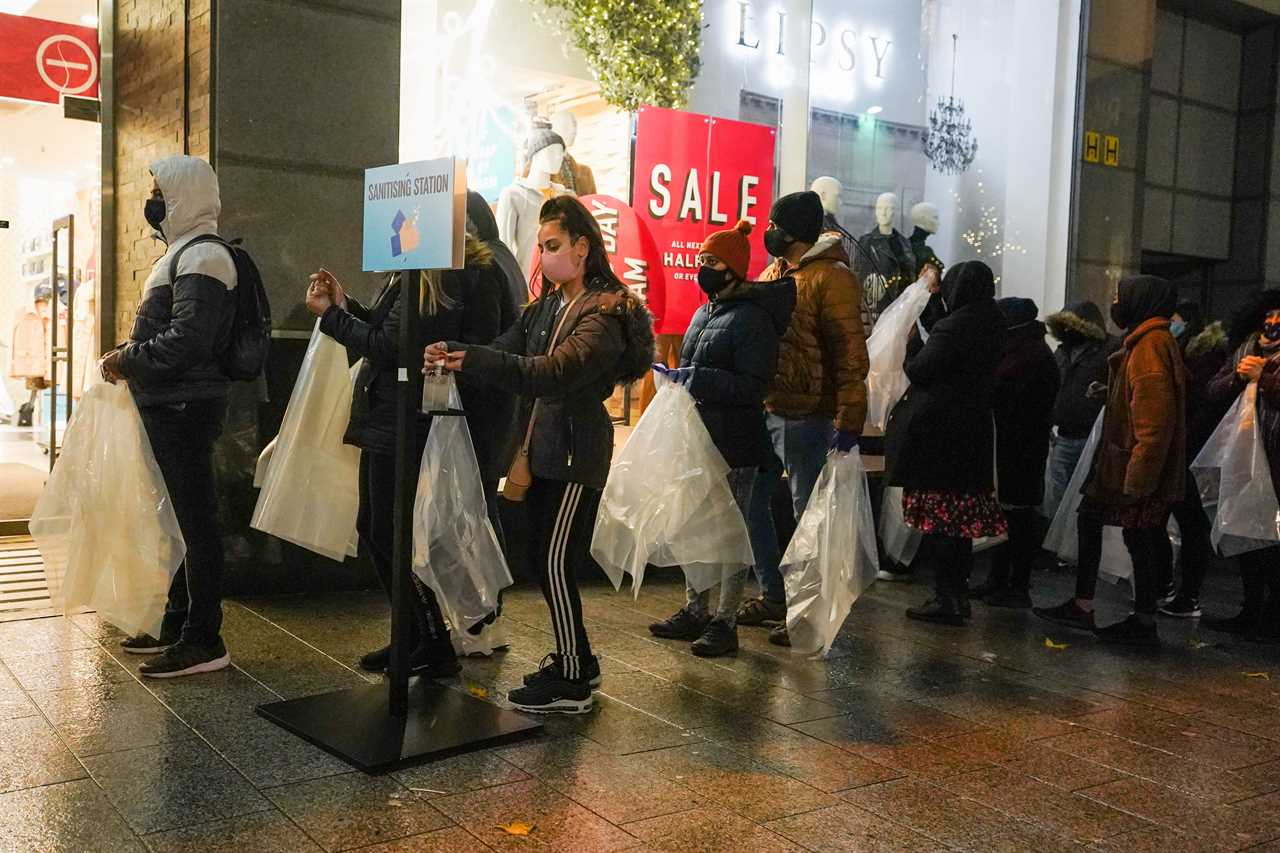 Bargain hunters queue from 4am to get their hands on the best deals in the Boxing Day sales