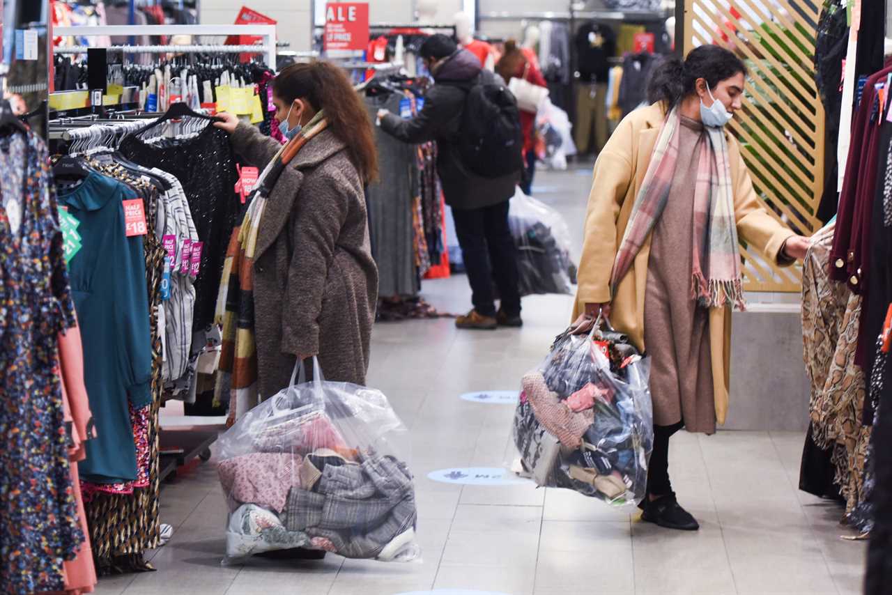 Bargain hunters queue from 4am to get their hands on the best deals in the Boxing Day sales