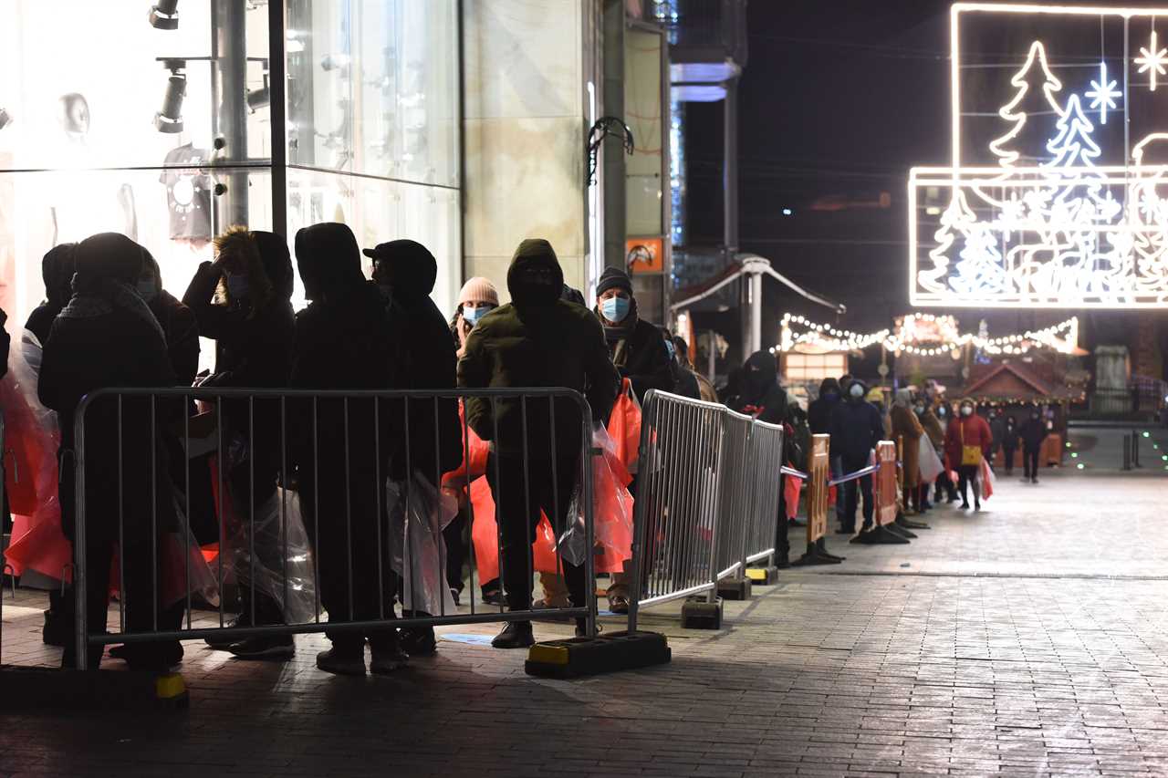 Bargain hunters queue from 4am to get their hands on the best deals in the Boxing Day sales