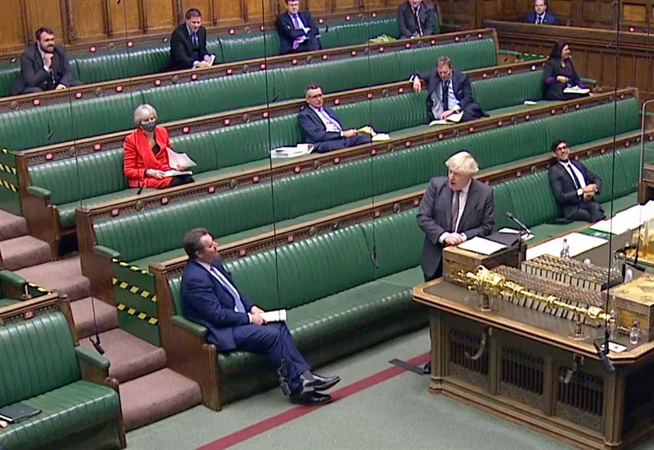 MPs vote to make Brexit deal law by 521 – 73 as history is made in Commons