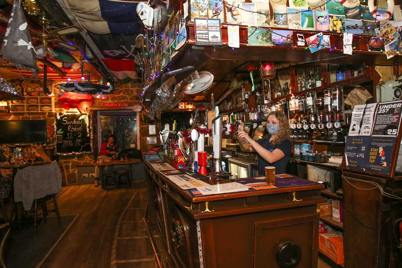 Punters on Scilly Isles toast New Year in the only pubs still open in Britain