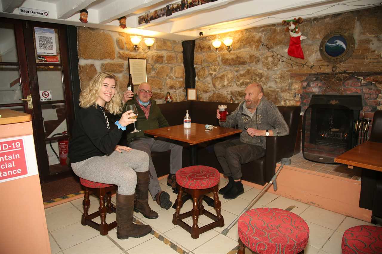 Punters on Scilly Isles toast New Year in the only pubs still open in Britain