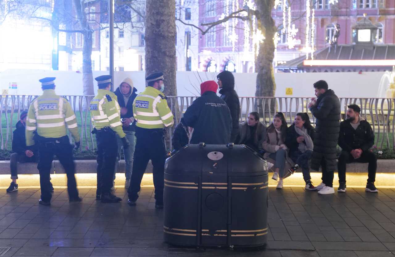 New Year’s Eve revellers flout Covid rules as cops break up illegal raves but cities are deserted as millions stay home