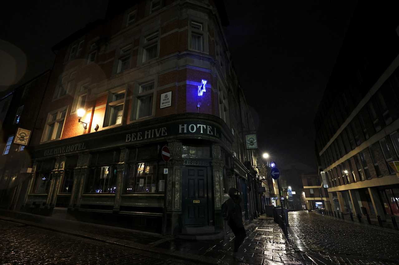 New Year’s Eve revellers flout Covid rules as cops break up illegal raves but cities are deserted as millions stay home