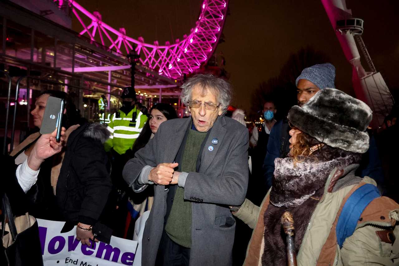 Maskless idiots mob A&E doctor yelling ‘Covid is a hoax’ as he leaves London hospital after New Year’s Eve late shift