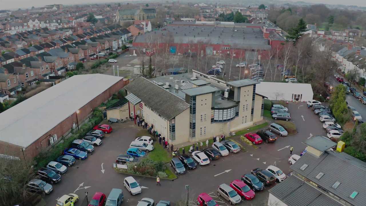 Drone footage shows long queue of people waiting to get Covid vaccine