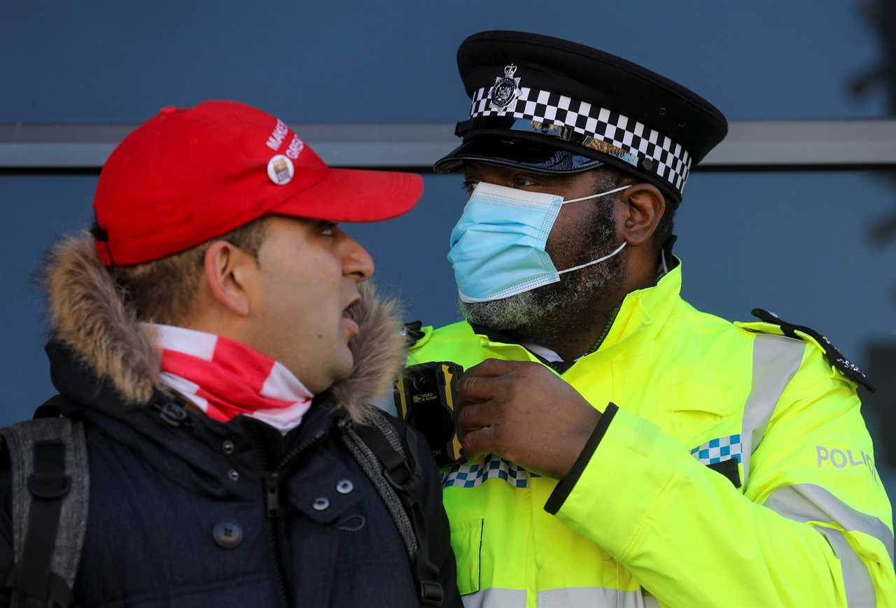 ‘Idiot’ anti-lockdown protesters clash with police 24 hours after Covid killed 1,325 on Britain’s deadliest day