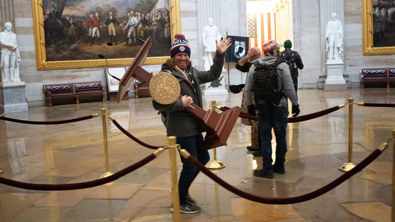 The man seen carrying Pelosi’s lectern inside the Capitol is arrested in Florida.