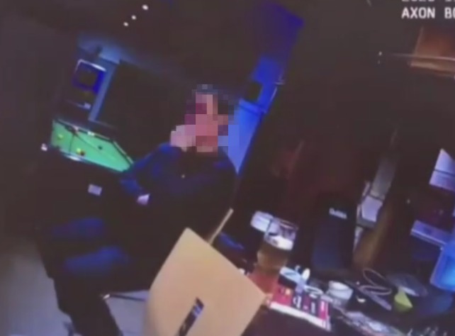 Moment cops catch punters breaking Covid lockdown after they snuck into pub to sink pints and sing karaoke