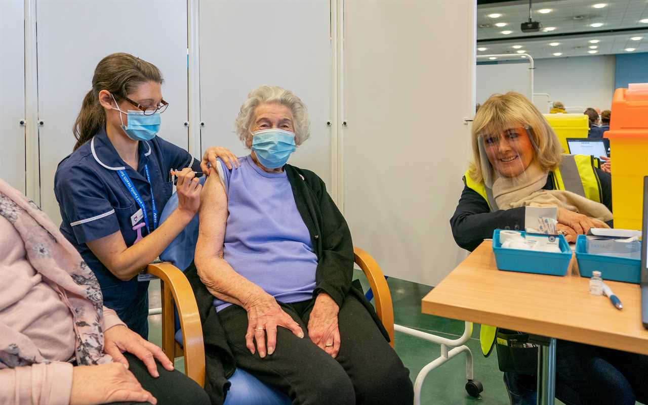 It’s freezing outside but inside Epsom vaccination centre there’s a glow of hope