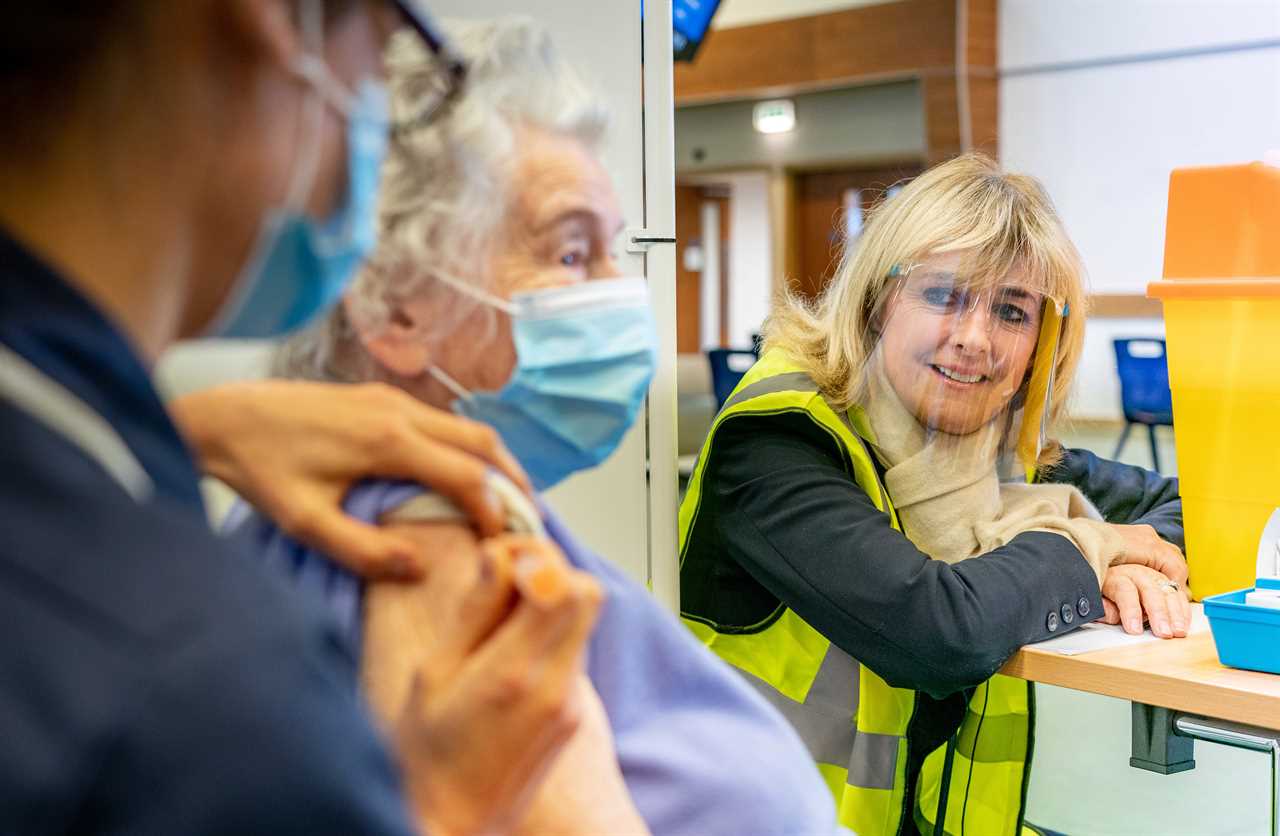 It’s freezing outside but inside Epsom vaccination centre there’s a glow of hope