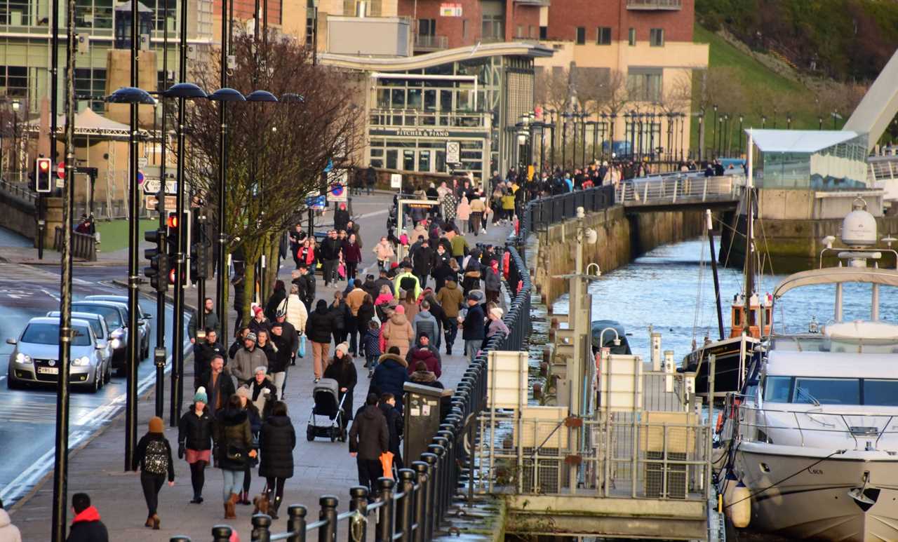 In Newcastle crowds of people walked along the riverside